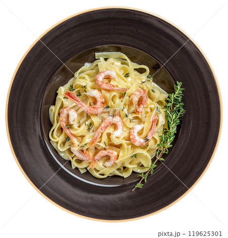 pasta with shrimps, Italian pasta fettuccine or tagliatelle in a creamy sauce with shrimps isolated on white background. top view. top view 119625301