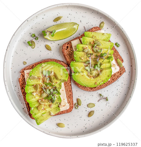 Avocado toast with feta on a plate isolated on white background. top view clipping path. top view 119625337