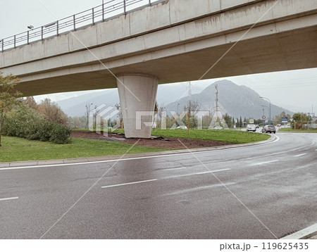 modern concrete bridge on an asphalt road. modern concrete bridge on an asphalt road. 119625435