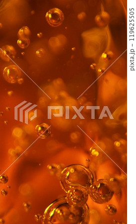 Detail of Cold Bubbly Carbonated Golden Liquid. 119625505