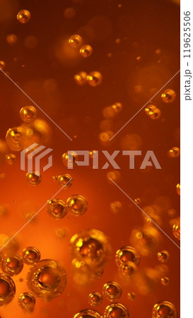 Detail of Cold Bubbly Carbonated Golden Liquid. 119625506