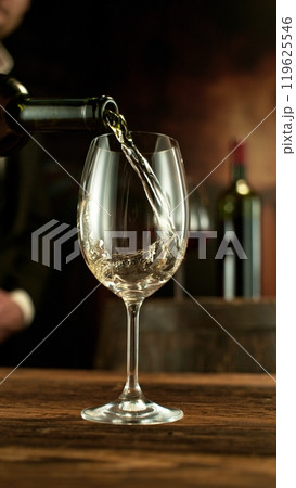 Detail of White Wine Pouring. Detail of White Wine Pouring. 119625546