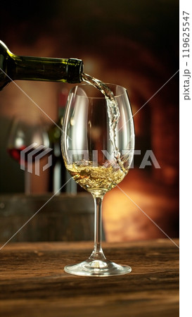 Detail of White Wine Pouring. 119625547