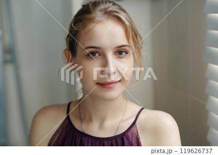 Portrait of Woman Smiling in Casual Indoors Setting Portrait of Woman Smiling in Casual Indoors Setting 119626737