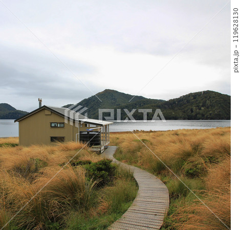 Public back country hut at Green Lake, New Zealand. 119628130