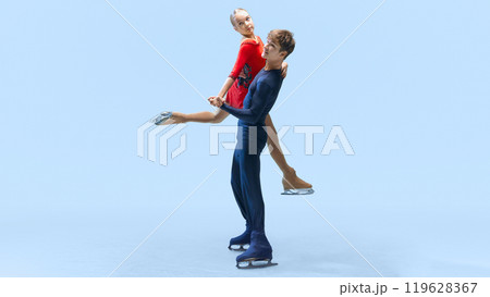 Charming, artistic man and woman on skating rink, performing figure skating tricks against cold blue background. 119628367