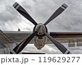 Conducting a detailed examination of the propeller blade with cloudy sky in the background. Transall C-160 Conducting a detailed examination of the propeller blade with cloudy sky in the background. Transall C-160 119629277
