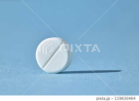 white pill on blue background 119630464
