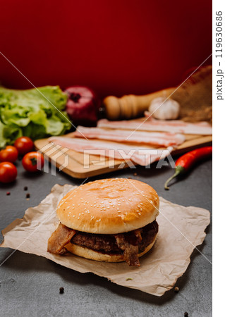 Juicy bacon burger with fresh ingredients, perfect for fast food lovers and gourmet enthusiasts Juicy bacon burger with fresh ingredients, perfect for fast food lovers and gourmet enthusiasts 119630686