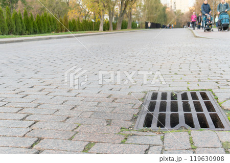 sewage water sewer flood drain rain road sewerage manhole grate street storm drainage 119630908