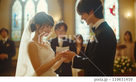 結婚式の指輪交換のシーン 119631450
