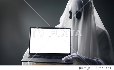 Ghost in Costume Holding a Laptop with a Blank Screen Ghost in Costume Holding a Laptop with a Blank Screen 119634324