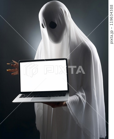 Ghostly Figure Displays a Blank Laptop Screen Against a Dark Background. 119634388