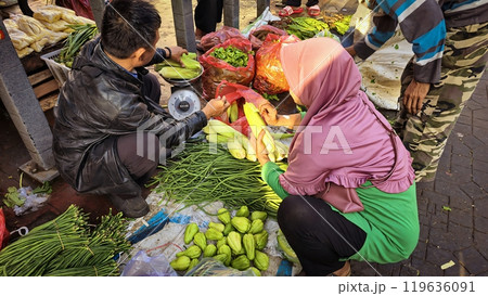 Asia wet market damp and humid market place activity consist of product vendor selling daily needs such as vegetables, meat, poultry, fish, fruits, and spices and public buyers Asia wet market damp and humid market place activity consist of product vendor selling daily needs such as vegetables, meat, poultry, fish, fruits, and spices and public buyers 119636091