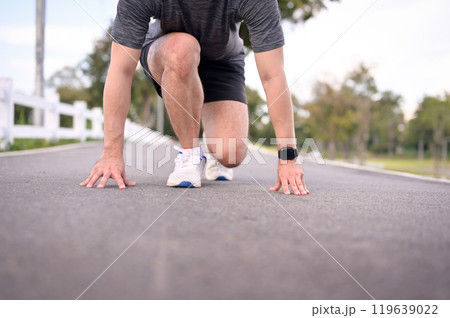 Athlete man in starting position ready for sprint. Goals and motivation concept 119639022