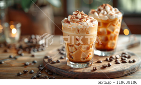 Cozy Cafe Table with Iced Coffee Lattes, Garnished with Coffee Beans and Whipped Cream 119639186