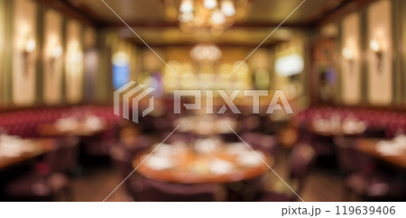 Blurred Pub Interior Warm Lighting Elegant Atmosphere Cozy Dining Space Vintage Decor Comfortable Seating Area Romantic Ambience Soft Focus Restaurant Background 119639406