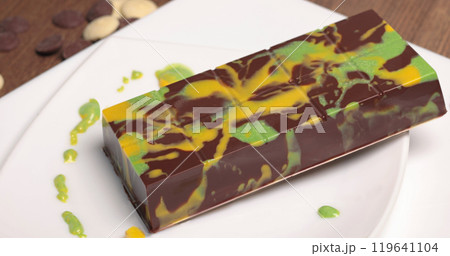 Dubai chocolate with pistachio paste and kataifi dough. Confectionery and sweets. Dubai chocolate with pistachio paste and kataifi dough. Confectionery and sweets. 119641104