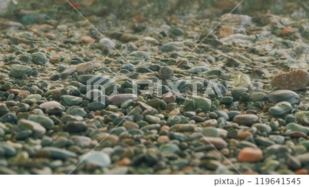 Stone At The Sea. Colorful Rolling Stones Sea Bottom. Multicolored Colorful Sea Pebbles. 119641545
