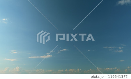 Cloud Background Summer. Beauty White Cloudy On Blue Sky With Soft Sun Light. Sky Replacement. Cloud Background Summer. Beauty White Cloudy On Blue Sky With Soft Sun Light. Sky Replacement. 119641575