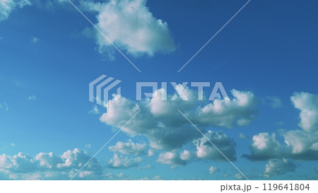 Tiny Fluffy Clouds In Sunny Day. Puffy Fluffy White Clouds. Cumulus Cloud Cloudscape. Atmosphere. Tiny Fluffy Clouds In Sunny Day. Puffy Fluffy White Clouds. Cumulus Cloud Cloudscape. Atmosphere. 119641804