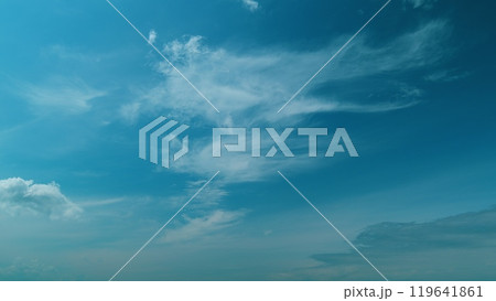 Moving Clouds Against A Blue Sky. Weather Forecast And Climate Or Atmospheric Layer. Creates A Parallax Effect. 119641861