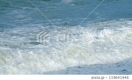 Calm On The Sea. Amazing Rolling Foamy Sea Wave Sparkling In Sun Washes Round Wet Pebbles. Still. Calm On The Sea. Amazing Rolling Foamy Sea Wave Sparkling In Sun Washes Round Wet Pebbles. Still. 119641948