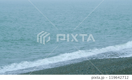 Sandy Coastline. Backlit Colorful Blue Turquoise Waves. Beautiful Relaxing View On Vacation. Slow motion. Sandy Coastline. Backlit Colorful Blue Turquoise Waves. Beautiful Relaxing View On Vacation. Slow motion. 119642712