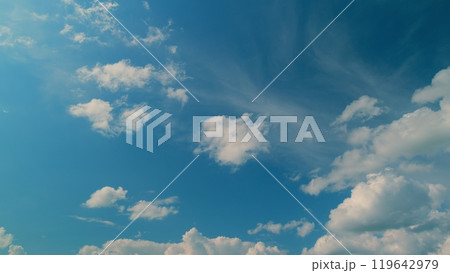 Summer Blue Sky. Bright Sun Light Ray Flare And Sunbeam Shining. B Roll Blue Sky And Gray Clouds Moving In Opposite Direction. Summer Blue Sky. Bright Sun Light Ray Flare And Sunbeam Shining. B Roll Blue Sky And Gray Clouds Moving In Opposite Direction. 119642979