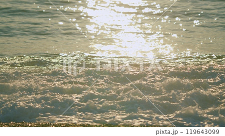Reflection Of Sunlight Over Lake Surface. Too Many Shiny Reflections Of The Sun In The Water. Slow motion. 119643099