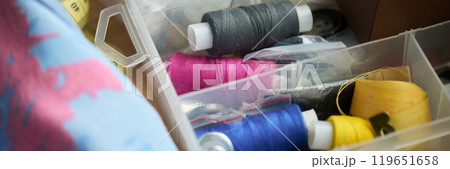 Part of container with sewing threads 119651658
