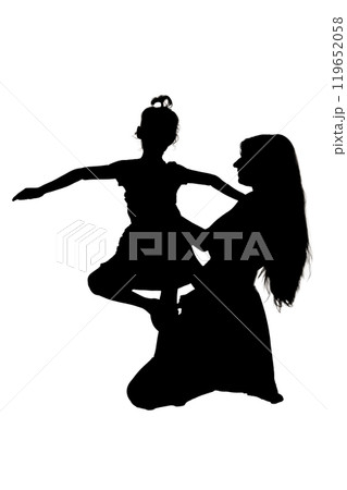 A mother and daughter joyfully dancing together in harmony 119652058