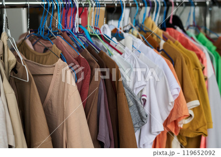 Casual attire of various colors on rack Casual attire of various colors on rack 119652092