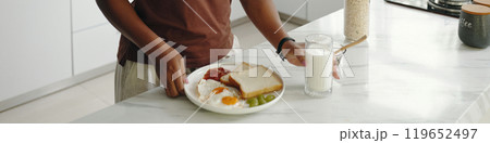 Preparing Healthy Breakfast in Modern Kitchen Setting Preparing Healthy Breakfast in Modern Kitchen Setting 119652497
