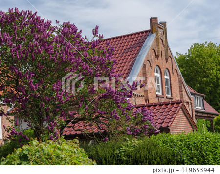 Greetsiel at the north sea coast in germany Greetsiel at the north sea coast in germany 119653944