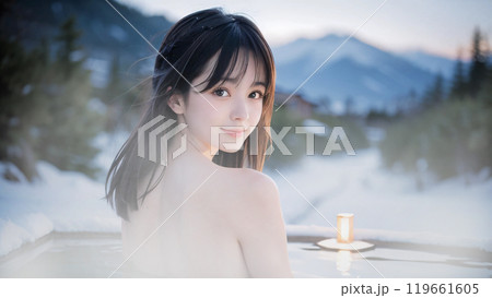 冬景色の温泉露天風呂に入浴中の若い女性	 119661605