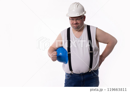 A Construction Worker is depicted wearing a Safety Helmet as well as a Blue Hard Hat A Construction Worker is depicted wearing a Safety Helmet as well as a Blue Hard Hat 119663811