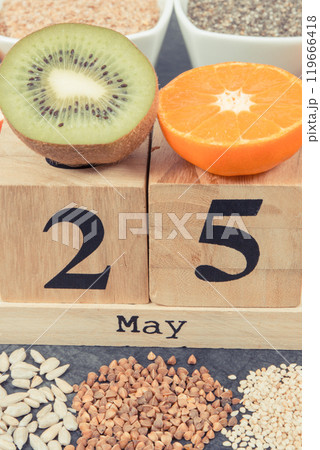 Nutritious food and May 25 on calendar as date of World Thyroid Day 119666418