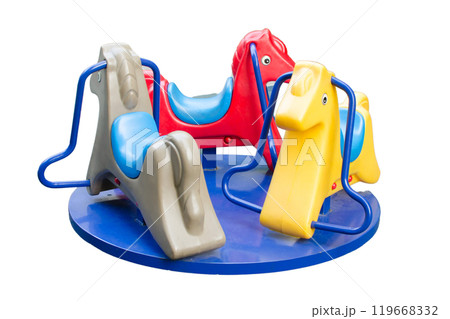 children's playground with a variety of play structures. The playground is surrounded by grass and trees 119668332