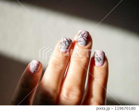 Female Hands With Light Pink Milky Aura Nails Manicure. Woman Fingernails With Pink Nails In Hard Sunlight Background. Floral Botanical Stamping. Aesthetic Visual Of Trendy Manicure With Nail Art. 119670180