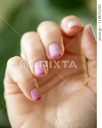 Two Colors Thermo Nail Polish - Light Pink and Bright Pink Lacquer or Gel. Trendy Duo Color Manicure. Female Hands With Pink Manicure - Beauty Background Two Colors Thermo Nail Polish - Light Pink and Bright Pink Lacquer or Gel. Trendy Duo Color Manicure. Female Hands With Pink Manicure - Beauty Background 119672202