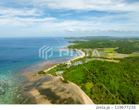 Beach resorts with white sands and farmlands. Santa Fe, Tablas, Romblon. Philippines. 119677238
