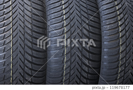 Identical Tread Pattern Design Of Non Studded Winter Tyres. New Car Tyres Texture Stock Photo For Background 119678177