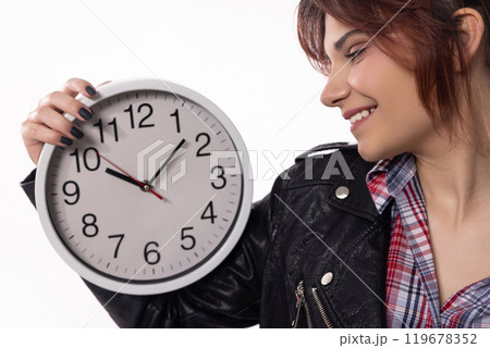 A Woman Delightfully Holding a Beautiful Clock, Radiating a Cheerful Smile on Her Face 119678352