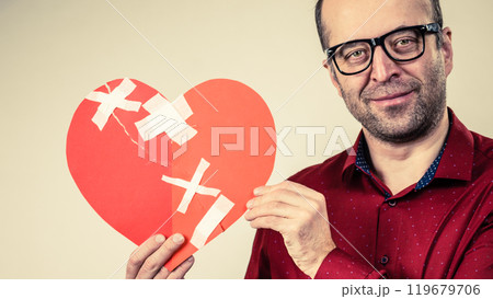 Smiling man with healed heart. 119679706