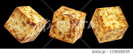 Fried tofu cubes isolated on black background, package design element Fried tofu cubes isolated on black background, package design element 119680030