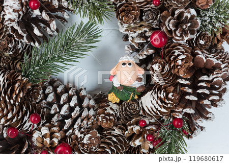 Elegant christmas wreath decorated pine cones and fir trees. Christmas mood. Elegant christmas wreath decorated pine cones and fir trees. Christmas mood. 119680617