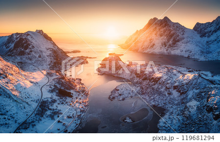 Aerial view of mountains and fjord at sunset in Lofoten Islands Aerial view of mountains and fjord at sunset in Lofoten Islands 119681294