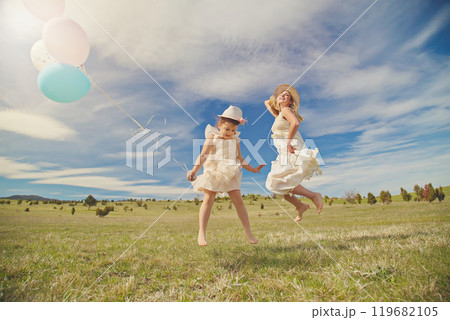 Young mother and her daughter having fun in nature park Young mother and her daughter having fun in nature park 119682105
