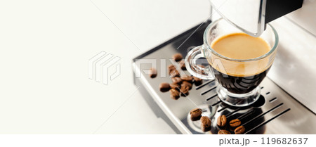 Coffee maker with a cup of coffee Coffee maker with a cup of coffee 119682637